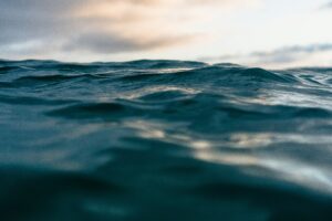 Calm waves on blue water.